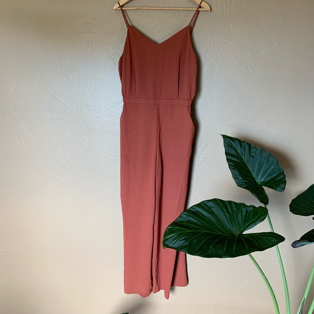 Uniqlo camisole jumpsuit, in rust. Size medium.
